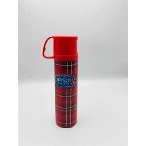 Austin’s original Deep Eddy Vodka red plaid 8 oz. thermos bottle with cup.